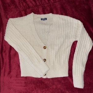 Cream coloured cropped knit cardigan
